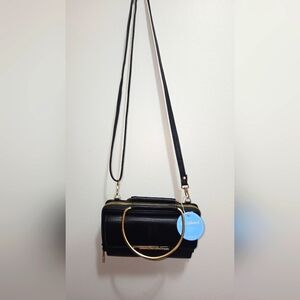 Chic Unlimited Elegant Black Handbag with Gold Accents